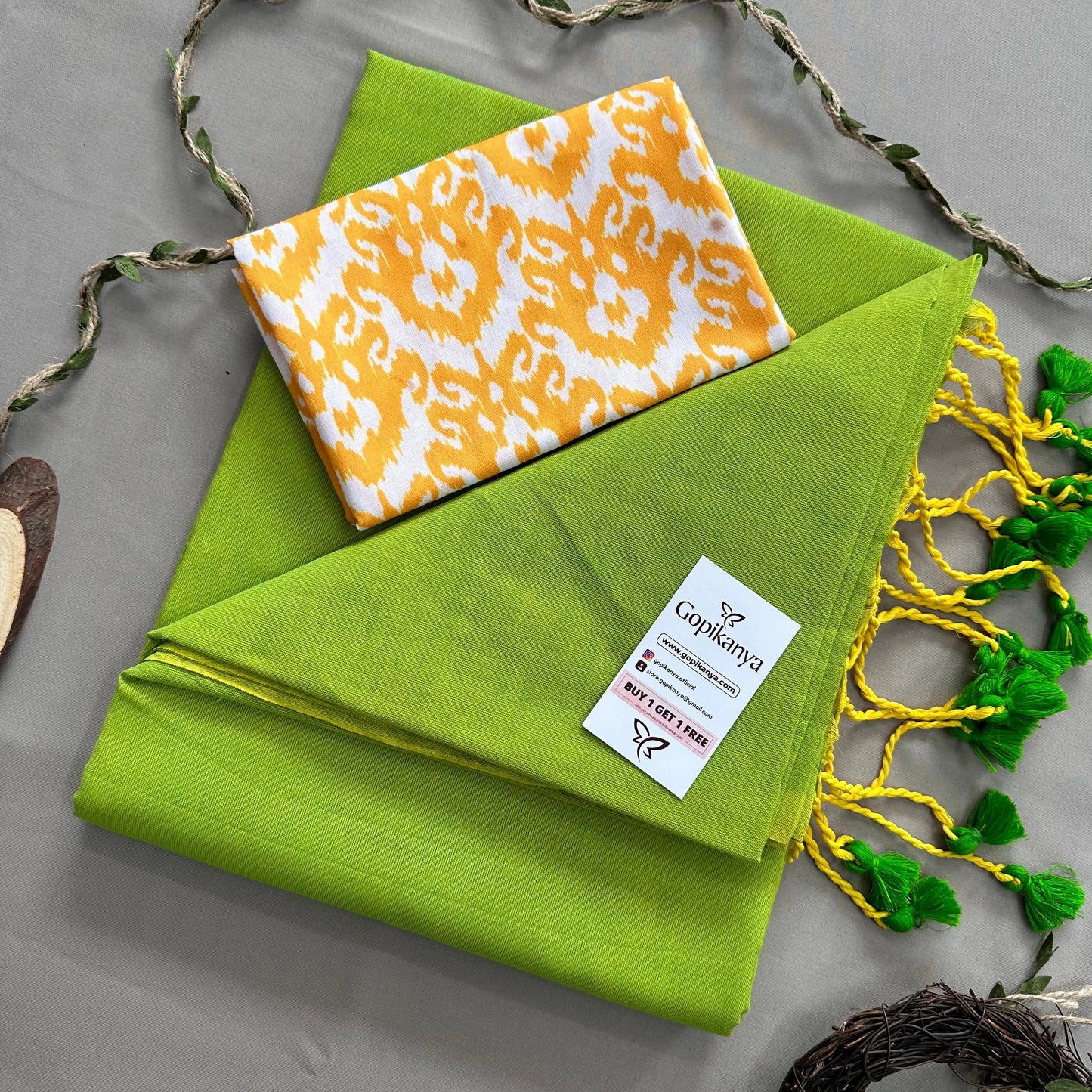 Perrot Green Handloom Cotton Saree With Yellow Printed Blouse